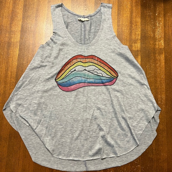 Tank top, no size tag - I would say fits like a loose medium or large. - Picture 1 of 2